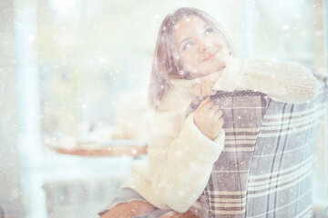 snowfall christmas atmosphere romance, portrait of a beautiful young blonde, winter trendy look