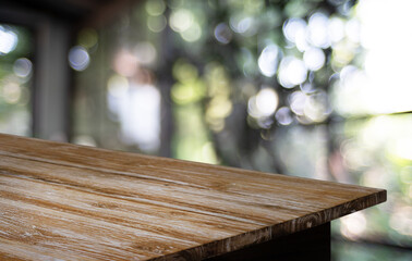 Wood Table Top in Blur Background room interior with empty copy space.