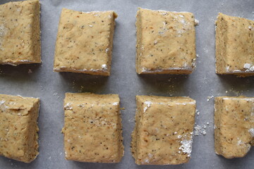 Raw biscuit or scone dough on baking tray