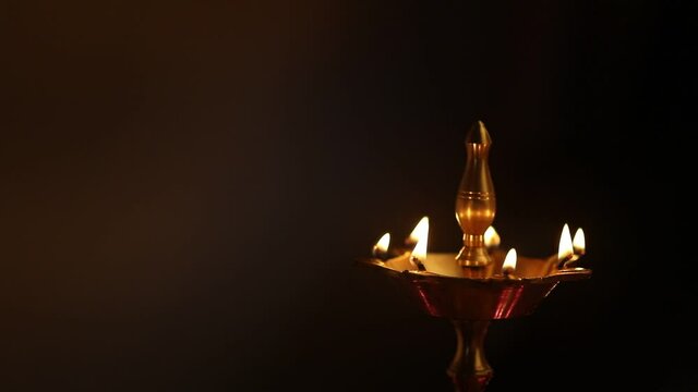 Colorful Clay Diya Lamps Lit During Diwali Celebration