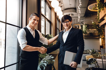 Happy Diversity Business People making Handshake Greeting. Partnership or Teamwork Concept