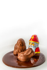 Schokoladen Figuren verschmelzen miteinander