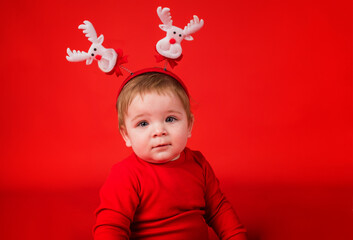portrait of a girl with a rim with deer on a red background