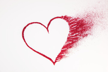Glitter heart dissolving into pieces on bright background. Valentines day, broken heart and love...