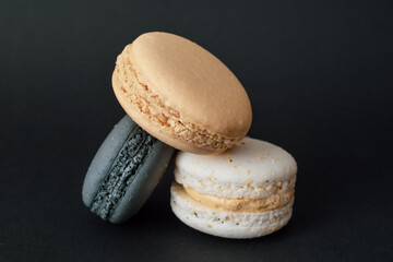 macaroons on a black  background