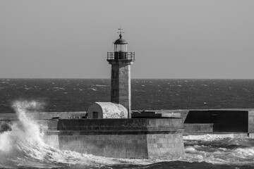 Lighthouse and waves