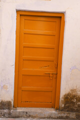 Obraz na płótnie Canvas Beautiful orange colored Indian gate in house.