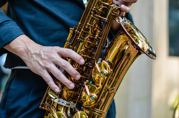 Obraz premium International jazz day and World Jazz festival. Saxophone, music instrument played by saxophonist player musician in fest.