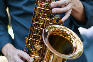 International jazz day and World Jazz festival. Saxophone, music instrument played by saxophonist...