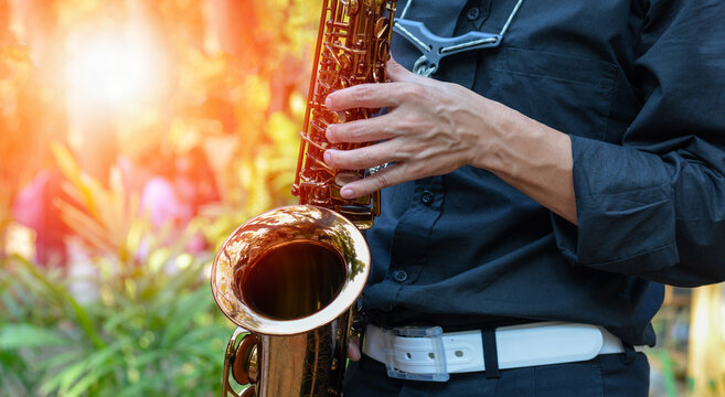 International jazz day and World Jazz festival. Saxophone, music instrument played by saxophonist player musician in fest.