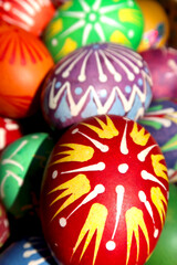 Easter eggs decorating, painting and colouring using dyes and hot wax technique. Tradition in the Czech Republic.