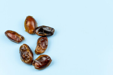 Close-up of dates on blue background