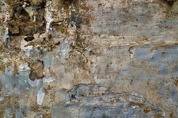 Old wall in the loft style. Background with the texture of broken concrete. High quality photo