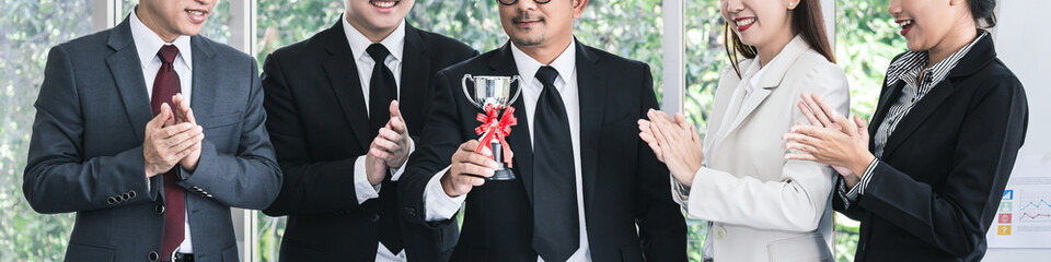 Winner asian business team in office