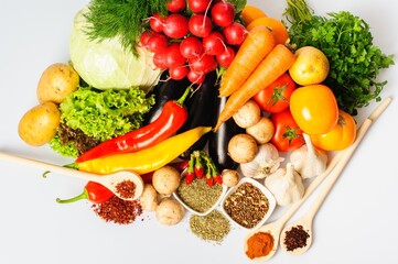 Vegetables and spices on a white background