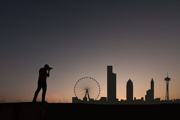 Fototapeta na wymiar man next to seattle city skyline silhouette