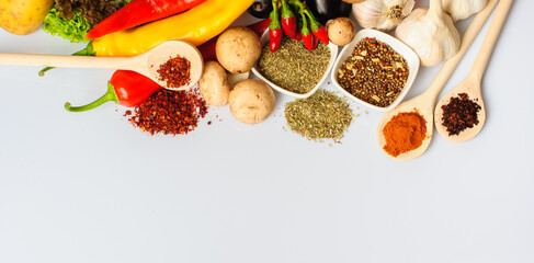 Vegetables and spices on a white background