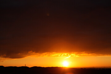 Fototapeta na wymiar Sonnenaufgang über dem Nordsee Wattenmeer
