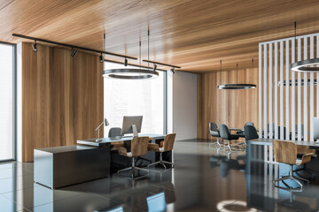 Modern gray and wooden open space office corner