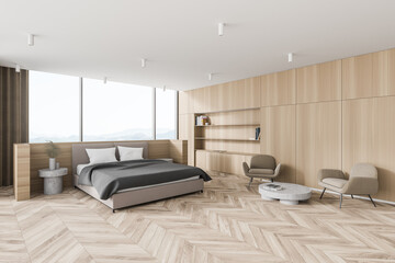 Modern wooden master bedroom corner with armchairs