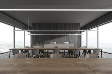 Table in modern gray panoramic cafe interior