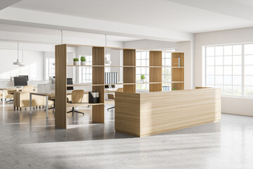 Modern white open space office corner with wooden tables and reception