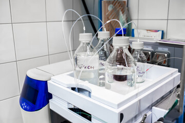 Stock solutions for a purpose of liquid chromatography analysis, bottles are connected directly to the machine