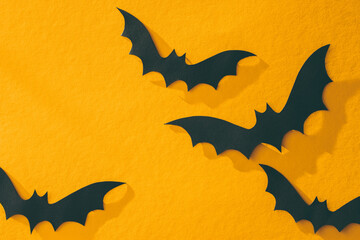 Bats on yellow background