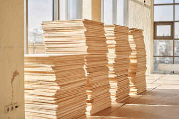 Plywood boards on the industry. layer of plywood, Construction site preparation for the flooring of...