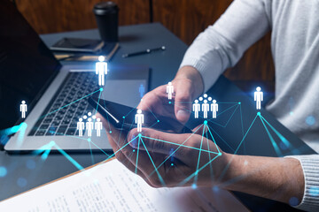 Man using phone. Hands typing smartphone. Double exposure with social network hologram. Close up. Internet concept.
