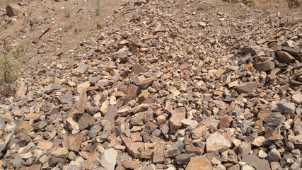 Top view of stones. A quarry is a place where different types of stones are extracted.