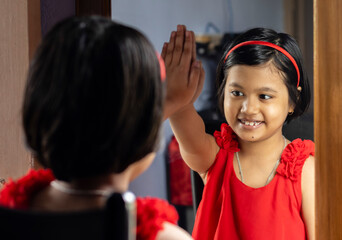a cute girl in front of mirror