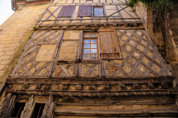 In the village of Saint-Emilion in the heart of the Bordeaux region, a timber-framed facade bears witness to the past.