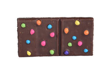 isolated brownie square with colorful candy pieces