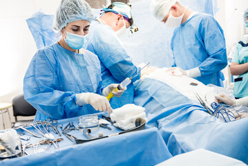 Surgery to remove the breast and replace it with an implant.