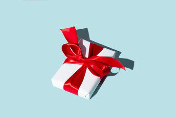 Holiday present. Gift delivery. Festive surprise. Anniversary congratulation. White box with red...
