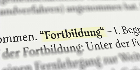 Fortbildung im Buch mit Textmarker markiert