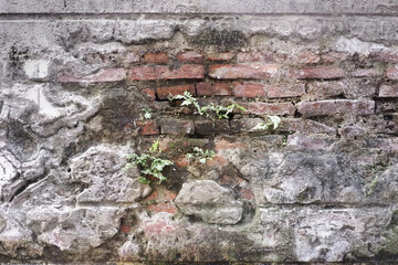 Weathered texture of cracked concrete vintage brick wall background
