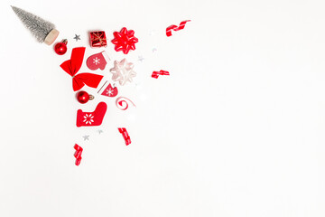 Fototapeta na wymiar Holiday xmas background. Stocking, gifts, winter tree, ribbon and bow in Christmas composition on white background for greeting card. Christmas, winter, new year concept.