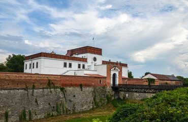 Fototapeta na wymiar Bridge and fortress gate of the historical fortess of princess Ostrozhsky in the ancient Castle of Dubno, Rivne region, Ukraine.