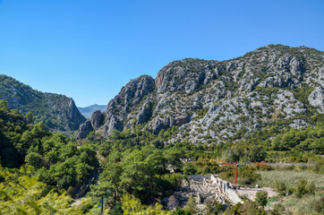 Fototapeta na wymiar Wild mountains. Rocks and pine trees of the Taurus Mountains. Lycian way. Beautiful nature in Turkey