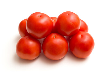 pink ripe tomatoes on a white background