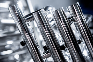 Abstract industrial background of metal pipes construction.
