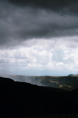 panoramic view of the mountains on a rainy summer day.