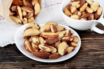 Brazil nut in a bowl on a wooden table