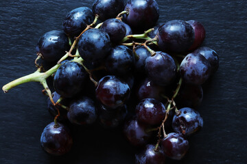 Photography of a bunch of black grape for food background