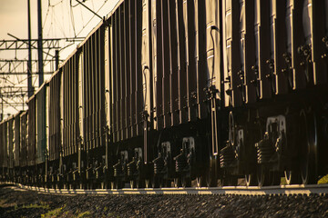 Transportation of industrial and civil goods by rail. Various types of wagons. Perspective photographs.