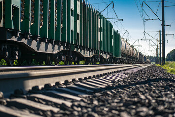 Obraz premium Transportation of industrial and civil goods by rail. Various types of wagons. Perspective photographs.