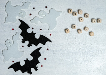 Background with ghosts and bats for Halloween. Trick or treat