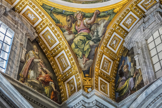 Interior of St. Peter's Basilica: Fragments of walls and ceiling of basilica. Papal Basilica of St. Peter in Vatican - world's largest church, is center of Christianity. VATICAN CITY. August 8, 2016.